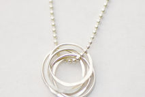 Spiraling Circles Necklace: Silver