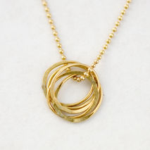 Spiraling Circles Necklace: Gold