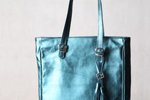 Teal leather tote. Shiny blue leather bag.